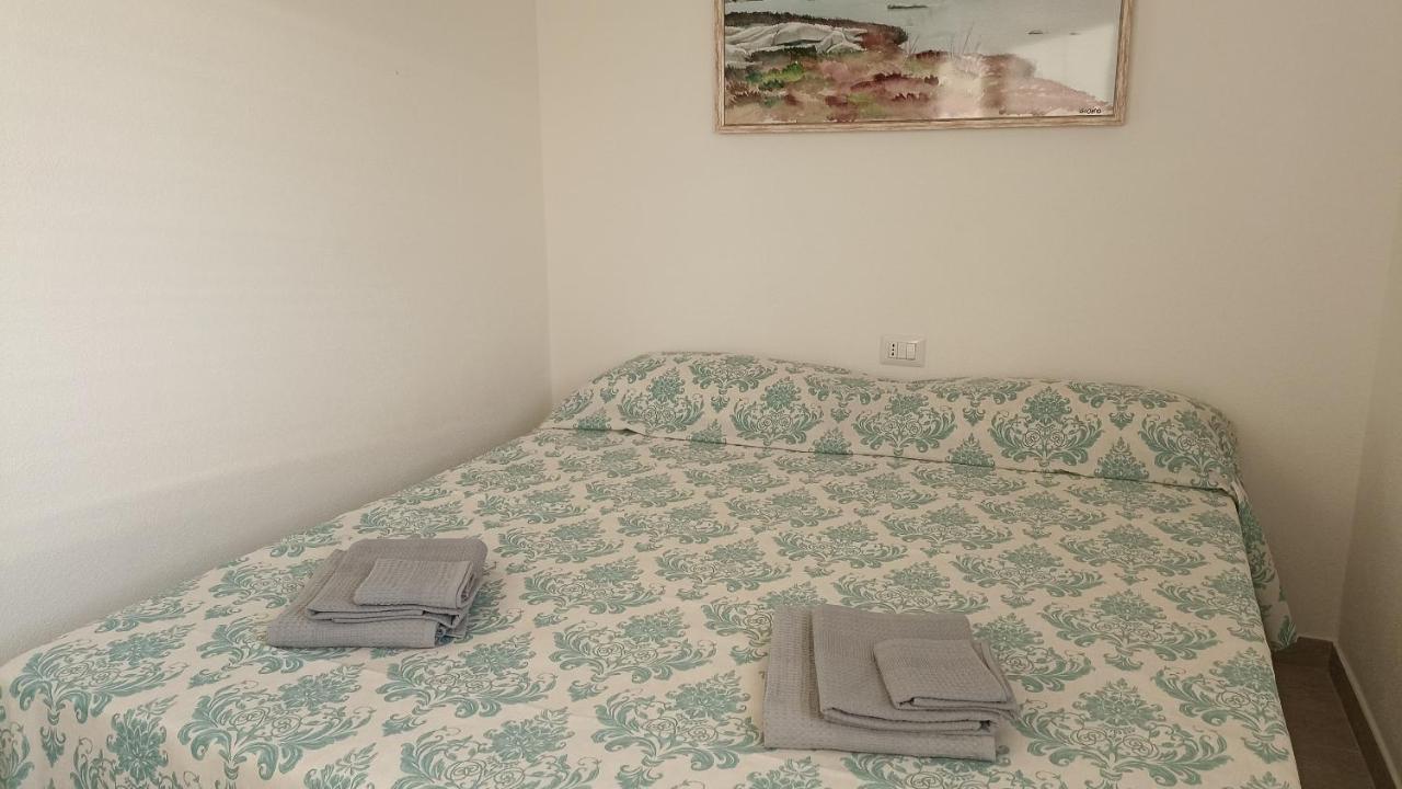 Welcomely - White Terrace - Condominio Acqualife Cannigione Kültér fotó